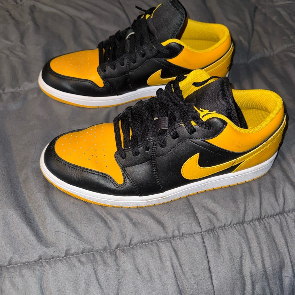 Nike Air Jordan 1 Low Men's Black and Gold Sneakers